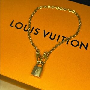 LV lock necklace